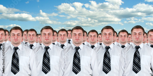 Many identical businessmen clones