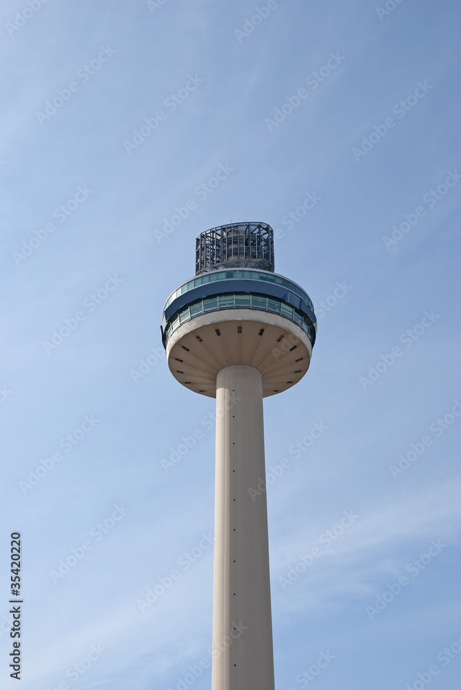 Concrete Radio Station Tower against a blue sky