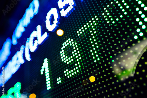 Canvas Print led display at night with stock infomation abstract