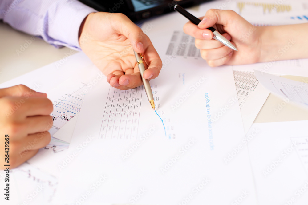financial and business documents on the table financial and business documents on the table