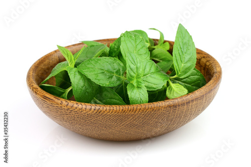 Mint in a wooden plate