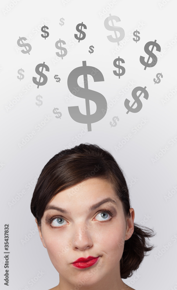 Young girl head looking at business icons and images Young girl head looking at business icons and images
