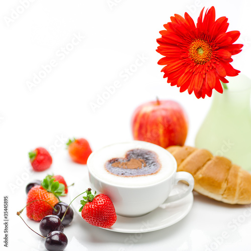 cappuccino in a cup in the shape of hearts gerbera apple cherry 