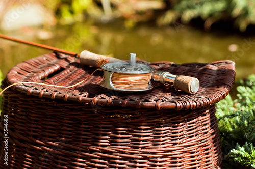Handmade split cane fly rod and wicker creel