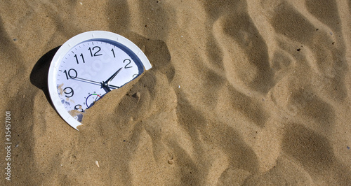 watch in the sand photo