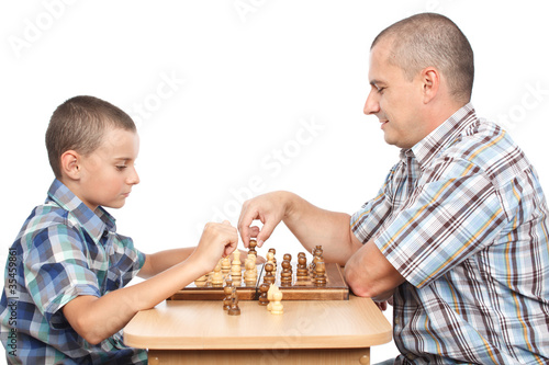 Father and son playing chess