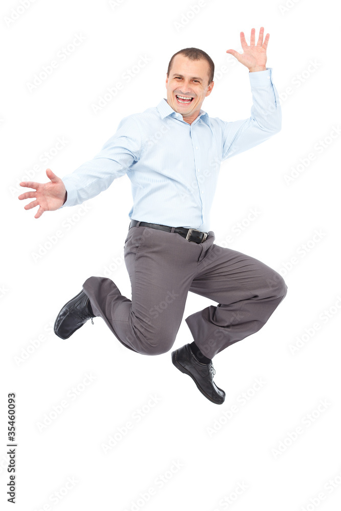 Businessman jumping for joy