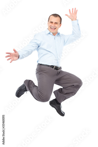 Businessman jumping for joy