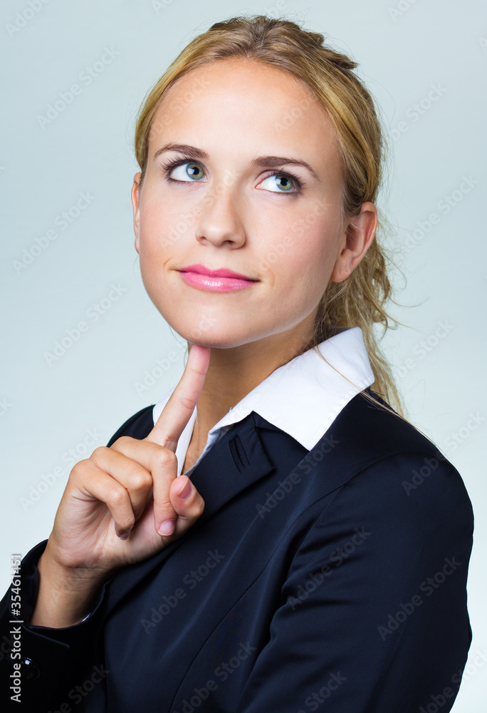 Closeup of a thinking blonde businesswoman Closeup of a thinking blonde businesswoman