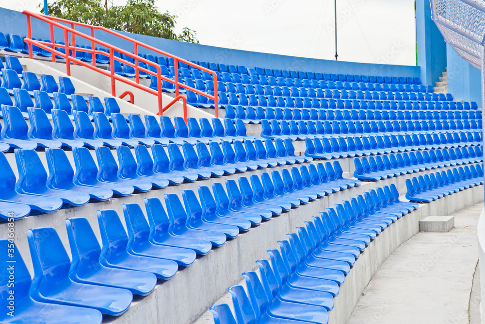 Fototapeta premium Plastic blue seats in a stadium in Thailand