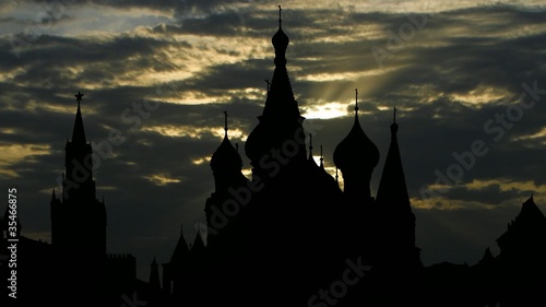 St.Basil`s cathedral and cloudy sunset photo