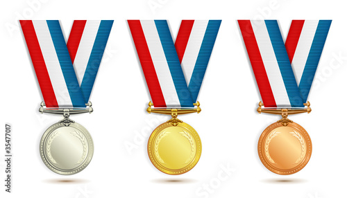 Set of gold, silver and bronze medals with ribbon