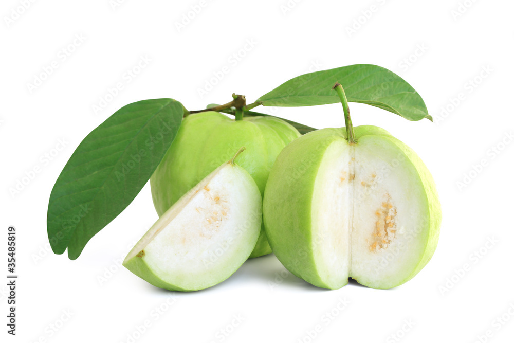 Guavas with leaves and guava were cut into pieces Guavas with leaves and guava were cut into pieces