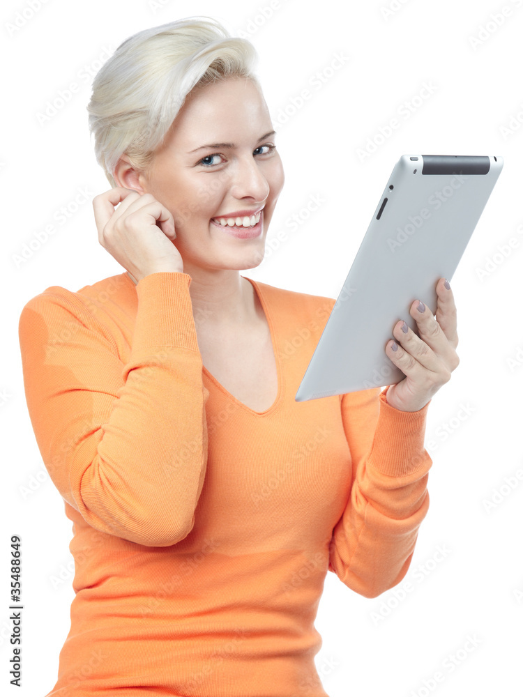 Pretty girl has fun with touchpad - ebook reader