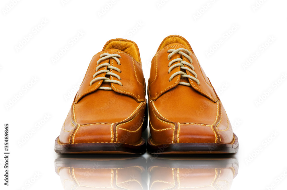 Fashion concept with male shoes on white