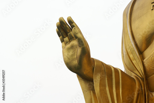 hand of golden buddha statue