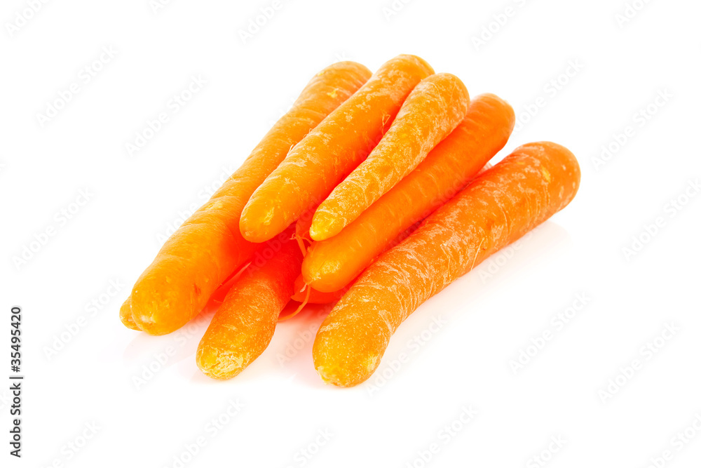 Pile of raw carrots over white background Pile of raw carrots over white background