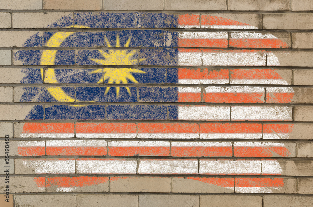 flag of malaysia on grunge brick wall painted with chalk