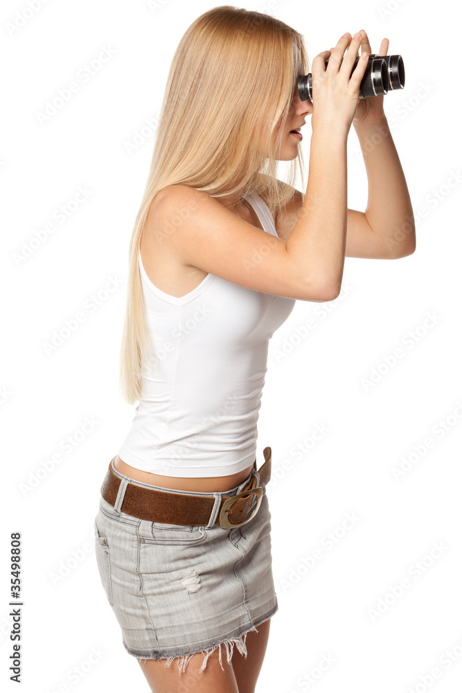 Side view of female looking through binocular Side view of female looking through binocular