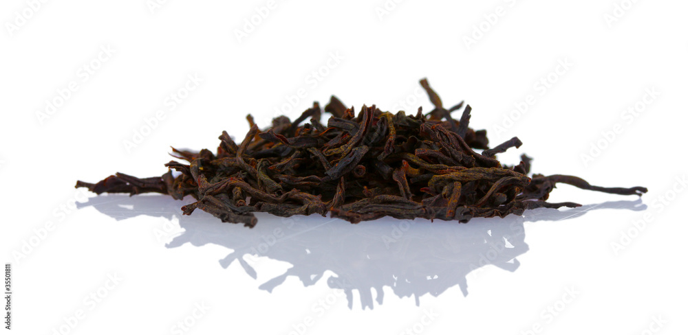 Fototapeta premium dry black tea leaves isolated on white