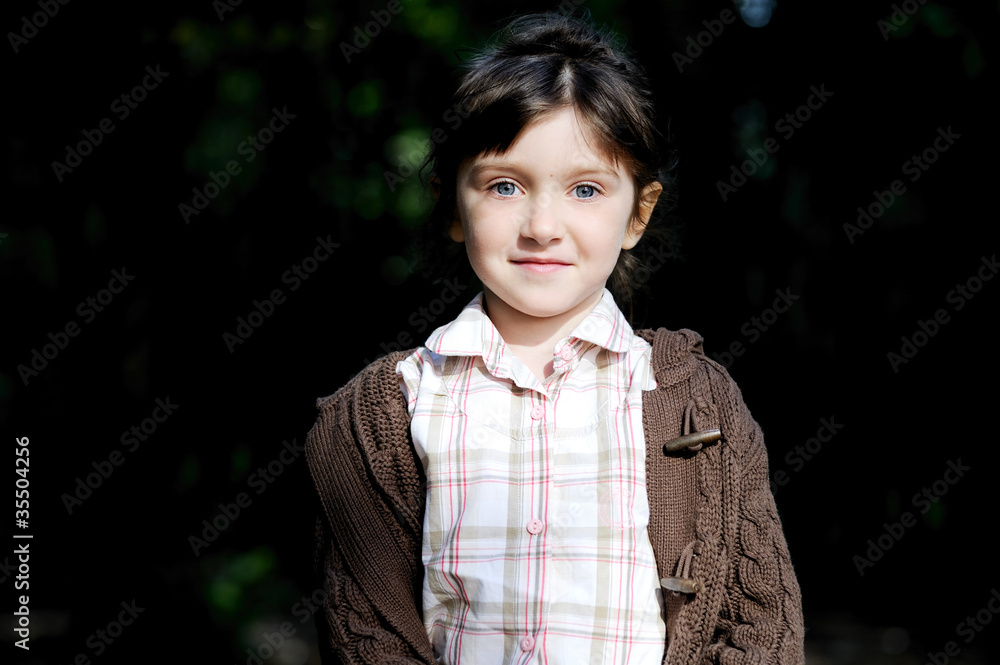 Portrait of adorable child girl in autumn forest Portrait of adorable child girl in autumn forest