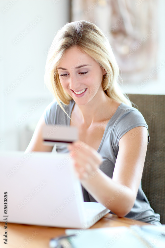 Young woman doing online shopping Young woman doing online shopping