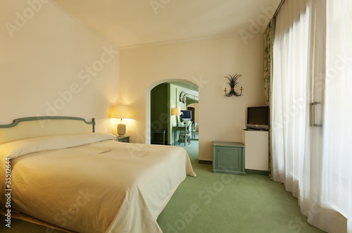 interior luxury apartment, comfortable bedroom © alexandre zveiger