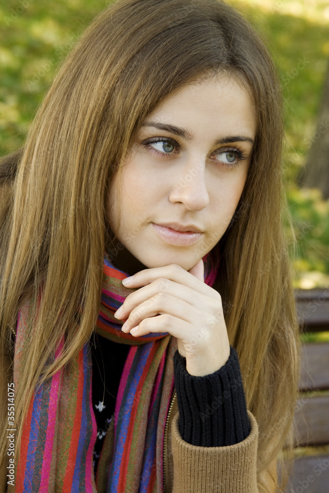 Portrait of an attractive young woman in autumn Portrait of an attractive young woman in autumn