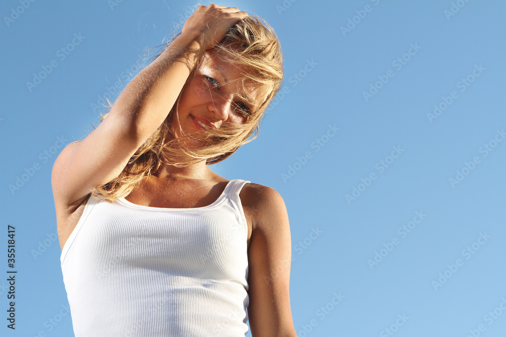 young woman on sky background young woman on sky background