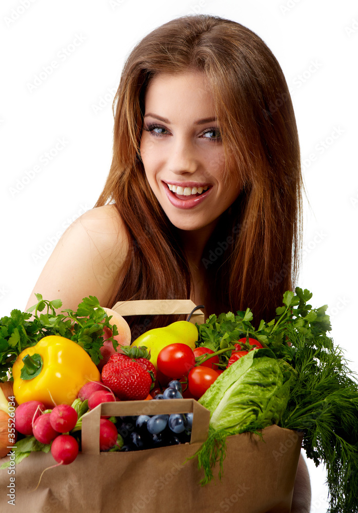woman holding a bag full of healthy food. shopping . woman holding a bag full of healthy food. shopping .