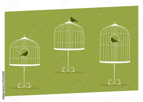 set of three vintage stands cages