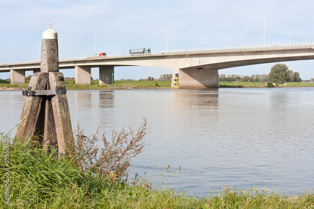 Concrete bridge crossing the river IJssel, the Netherlands Concrete bridge crossing the river IJssel, the Netherlands