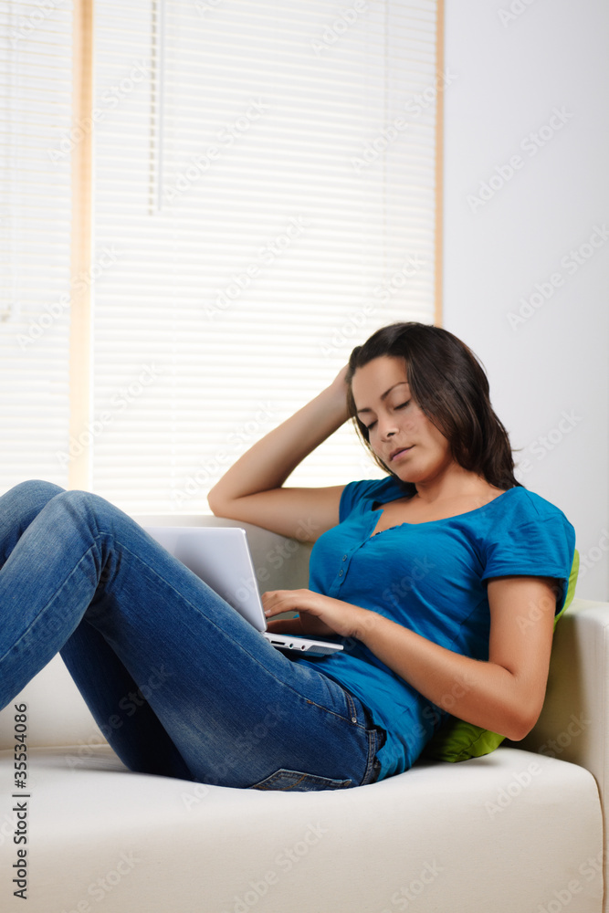 woman  sleeping on a couch