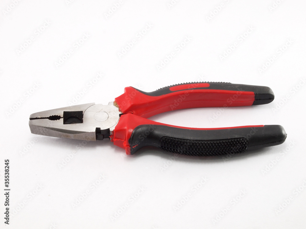 Black and red pliers with isolated on the white background Black and red pliers with isolated on the white background