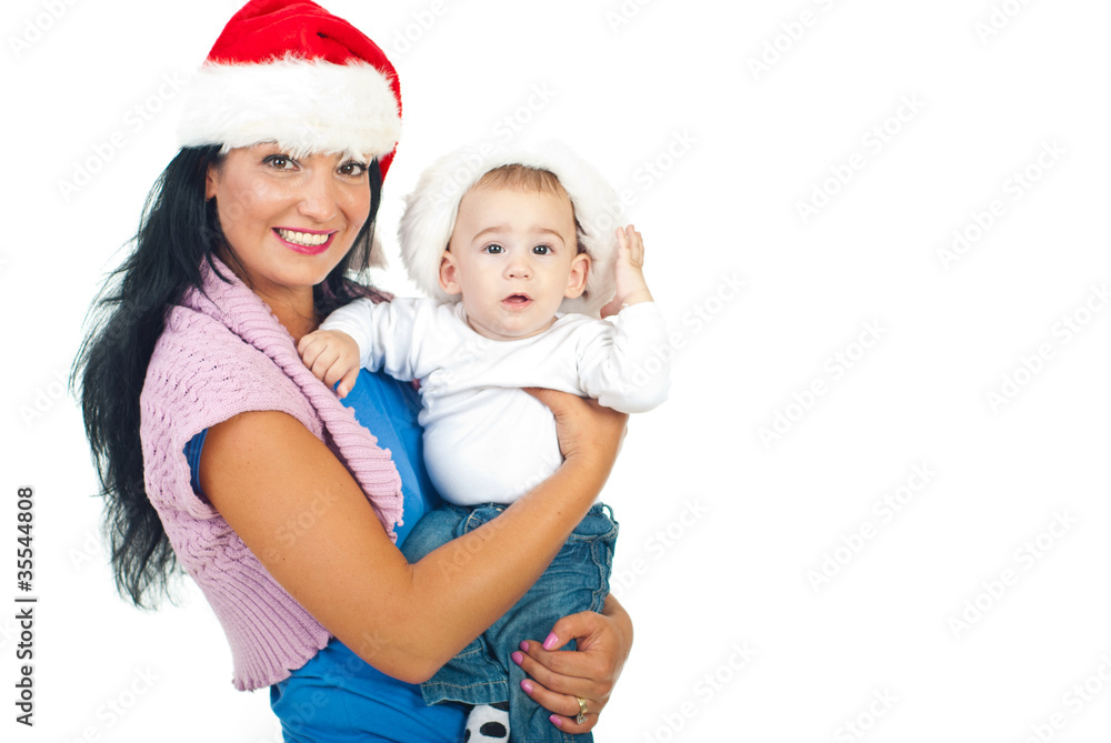 Mother and baby son with Santa hats