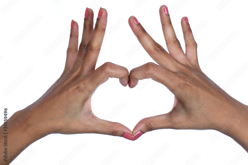 Hands forming a heart on white background