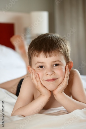 Wallpaper Mural Little boy laying on bed Torontodigital.ca