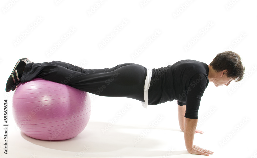 senior woman fitness exercise push ups with core training ball senior woman fitness exercise push ups with core training ball