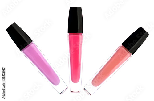 lipsticks (lipgloss) of pink color isolated on white background