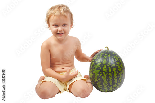 Boy with a watermelon on a white background