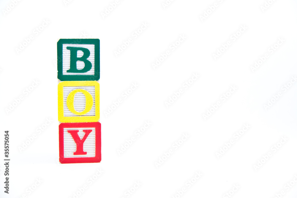 Boy Blocks in a Tower isolated over white Boy Blocks in a Tower isolated over white