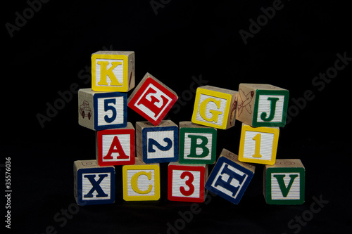 Pile of Alphabet Blocks over Black