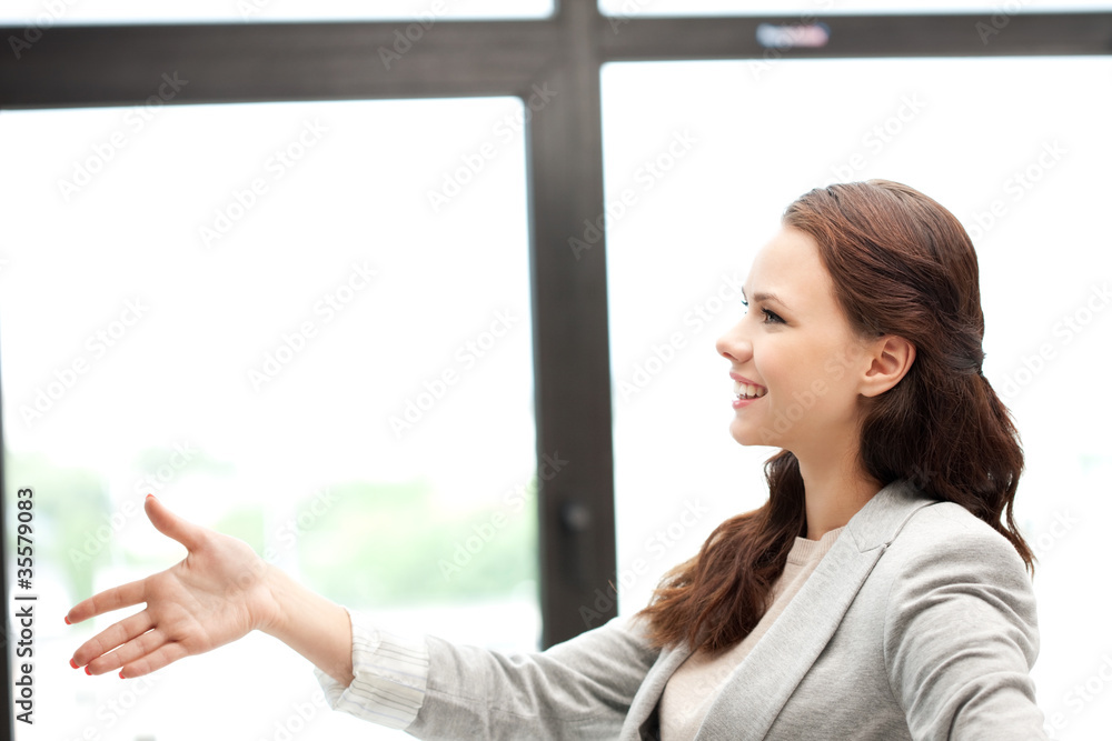 woman with an open hand ready for handshake