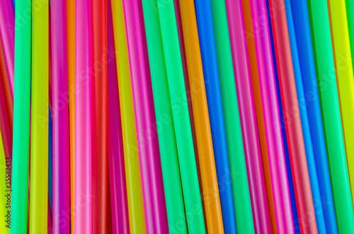 Colorful drinking straws background.