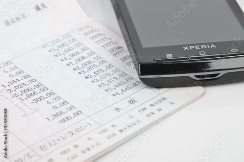 Fotografia Smart phone and passbook
