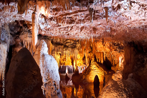 Mineral rock formations inside a beautiful deep cave