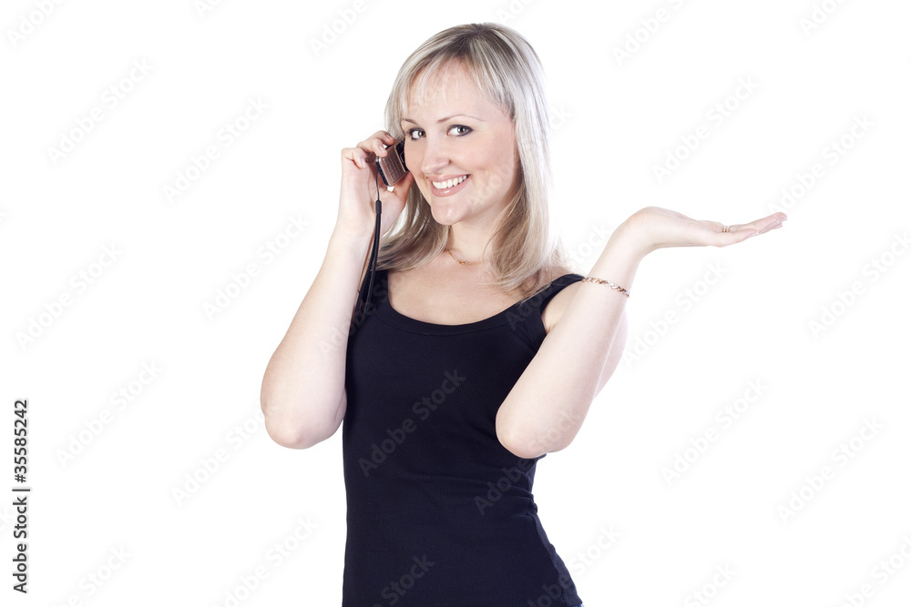 Fototapeta premium Young woman talking on the phone