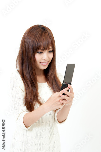 pretty asian woman using cellphone