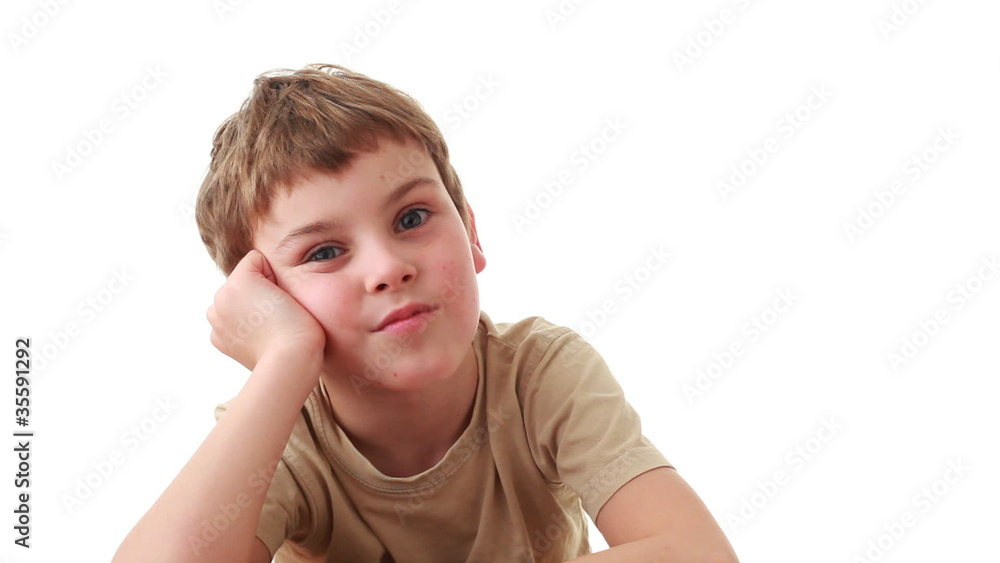 Little boy sits leaning to hand, then takes bouquet roses Little boy sits leaning to hand, then takes bouquet roses