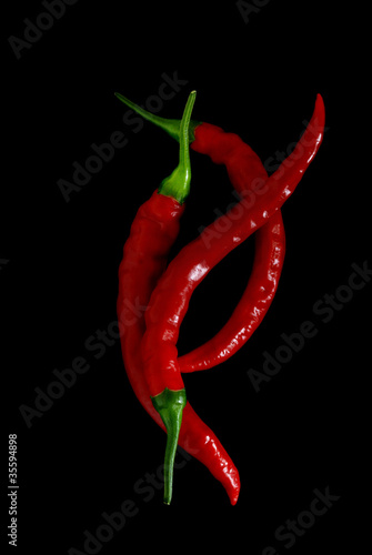 Red hot chili peppers on black